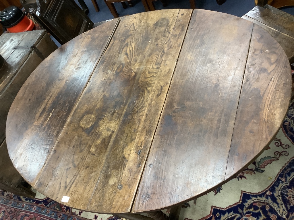 A six-seater oak gateleg dining table, late 17th century, 148cm (extended) depth 122cm, 74cm high.